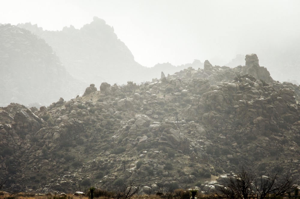 Mist drifting over a rocky ridge