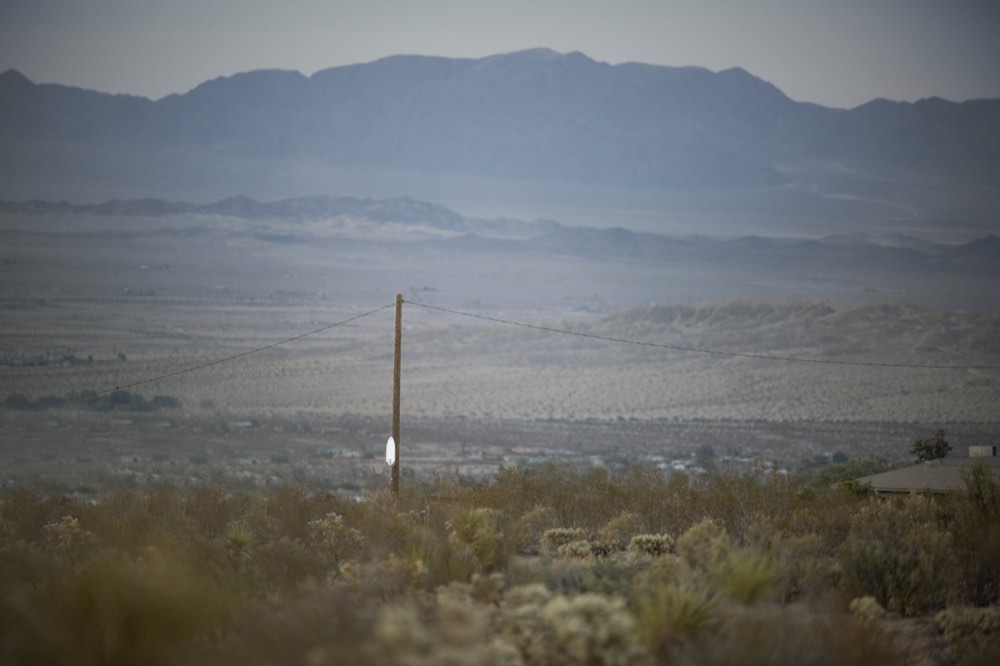 The valley spread out far below from the high desert rim